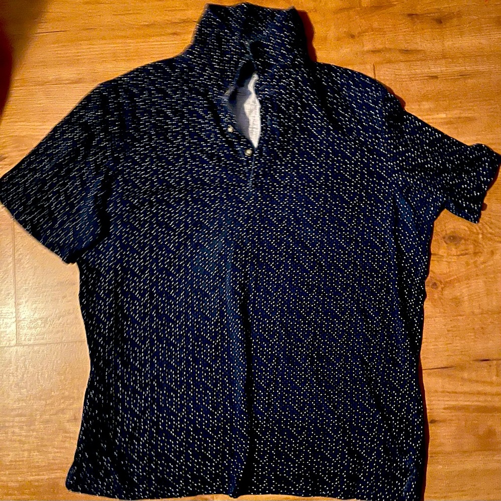 Blue polo w/ multi color polk a dots